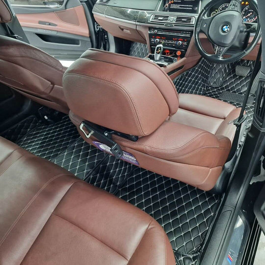 Lux-Beautyplus™ 3D Full Coverage custom car mats in a BMW interior, featuring brown leather seats and stylish design.