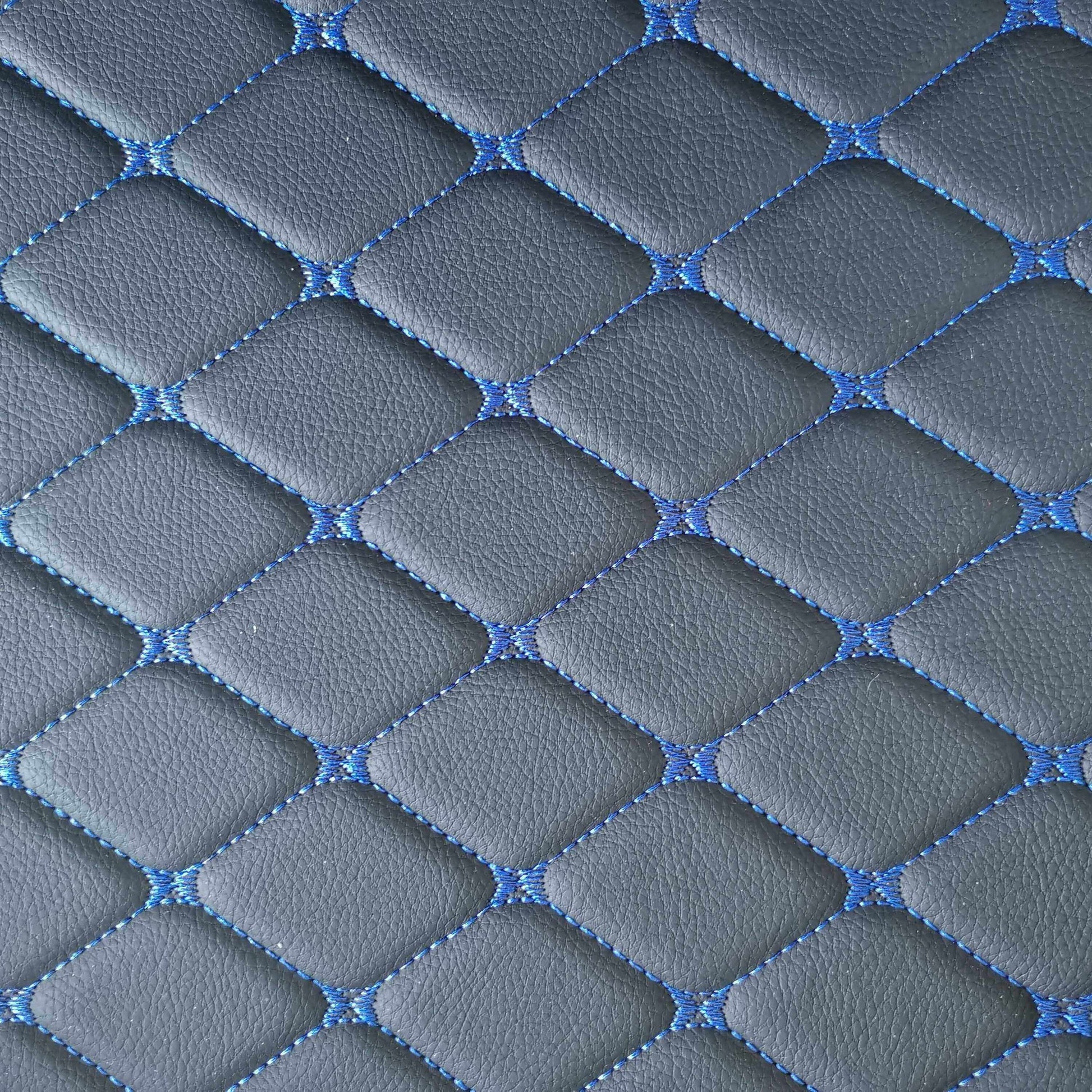Close-up of diamond-stitched car mat texture in gray and blue, showcasing a stylish and durable design.