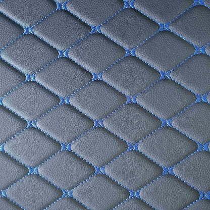 Close-up of diamond-stitched car mat texture in gray and blue, showcasing a stylish and durable design.