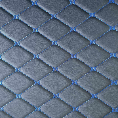 Close-up of diamond-stitched car mat texture in gray and blue, showcasing a stylish and durable design.