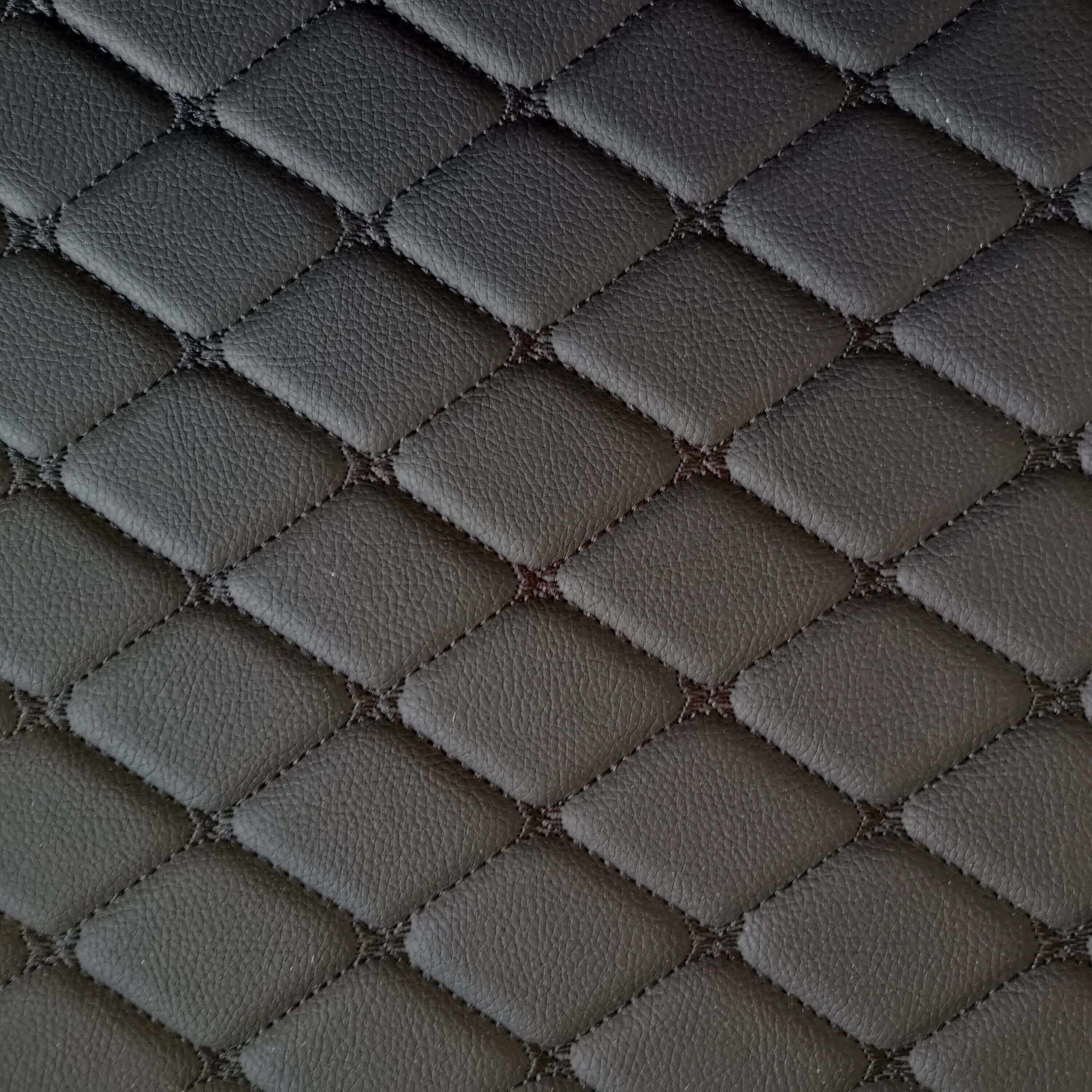Close-up of diamond-stitched black leather texture, ideal for car interior mats and upholstery.